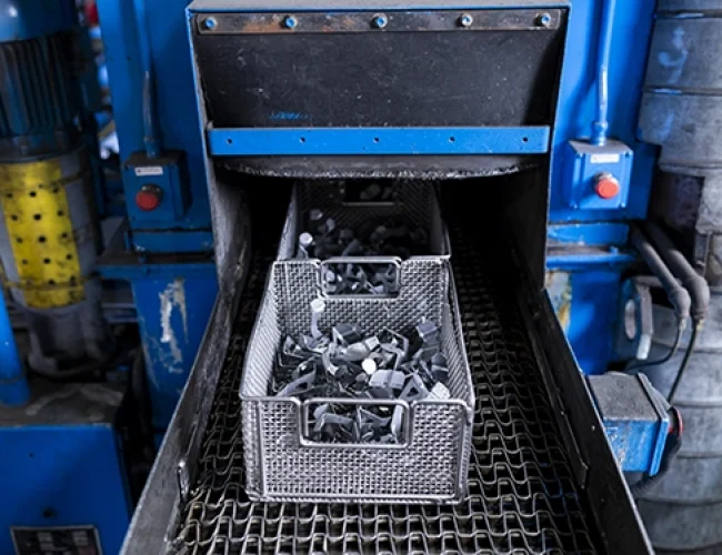 Parts fixtured for peening
